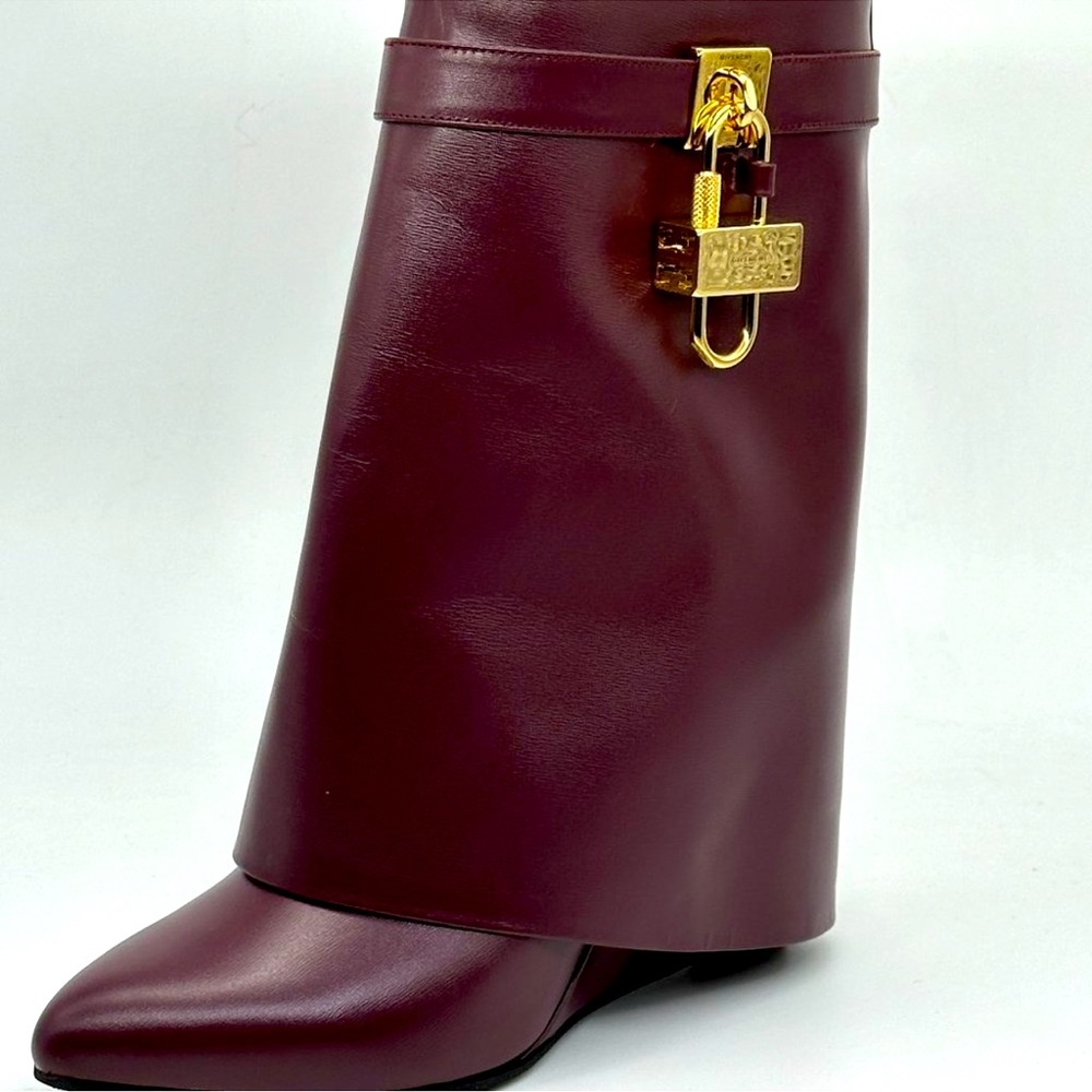 Beautiful Givenchy Shark boots in A deep Burgundy color.